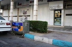 نصب استیکر های آموزشی برروی مخازن زباله